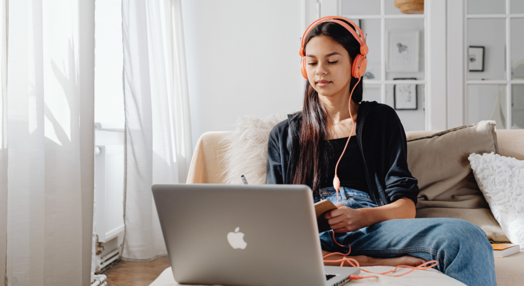 student with noise cancelling headphones